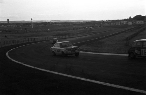 Mini cooper leads two - a, ford
