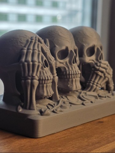 Three wise skulls see hear - wise,