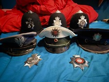 MIXED BUNDLE OF POLICE PEAKED CAPS EUROPEAN MIXED CONDTIONS & FORCES ALL USED.
