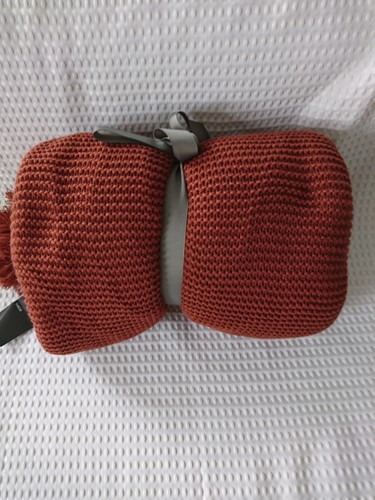 Knitted rust tassle throw - m&s,