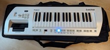 Roland LUCINA AX-09 White Keytar with Thomann Soft Case, Batteries and PSU/Strap