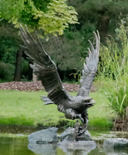 metal life size eagle on dish