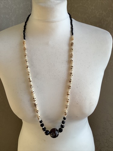 Hand carved skull phone beads