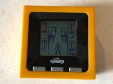 Radica Cube World Block Bash yellow Good Played with condition See Photos