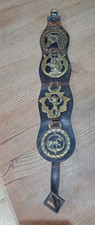 4 horse brasses on leather