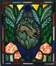 Stained glass panel with hare.