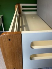 Feather and Black Cabin Bed