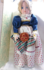 "THE QUEEN OF HEARTS"  hand painted porcelain doll from The Leonardo Collection.