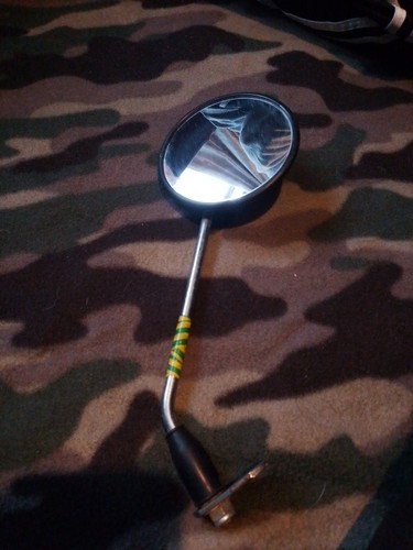 Plastic round mirror possibly - plastic,