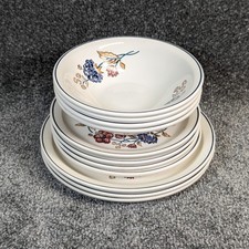 Set Of 12 Camargue Plates &