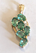 Hallmarked Gemporia 9ct gold, Colombian emerald & diamond pendant 2.6 gms
