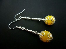 A PAIR OF YELLOW JADE SILVER