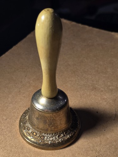 Vintage brass hand bell handle - hand,