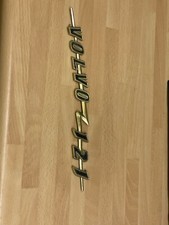 Rare Genuine metal Volvo 121 badge Vintage 1960's Gold and  Black