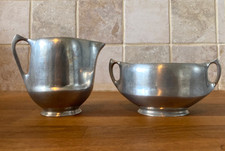 Vintage Picquot Ware Milk jug and Sugar Bowl .. stamped at base