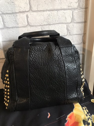 Authentic studded mcm genuine - studded,