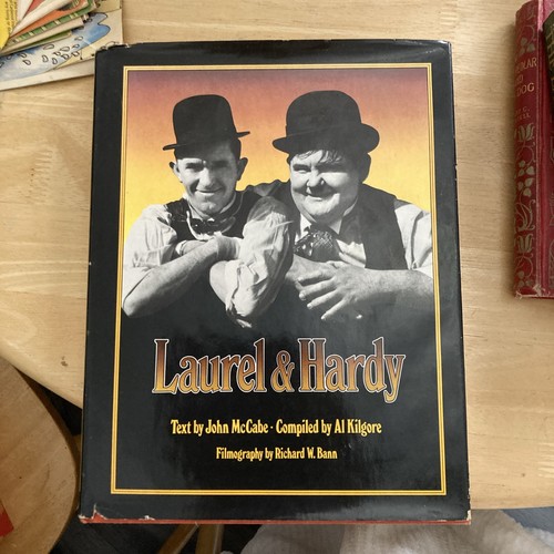 Laurel hardy text - &, by