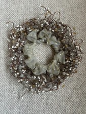 Decorative Christmas Table Wreath with twig like branches, beads, ribbon etc