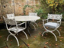 Four White Cast Iron Garden