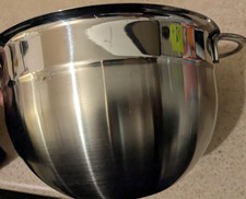 fondue set new never used. Silver metal. plastic covering all forks. 