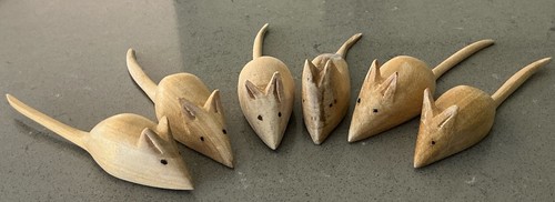 Hand carved mice - hand,