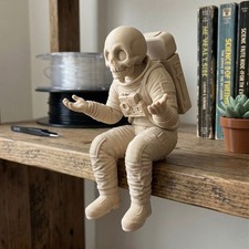 Perplexed astronaut skeleton - astronaut,