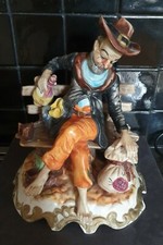 Capodimonte Tramp On Bench