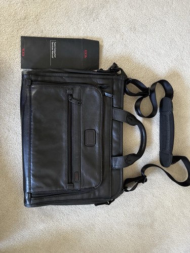 Tumi black leather - 15.75”,