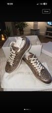 Gold Jimmy Choo Trainers