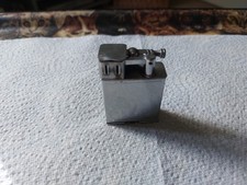 Silver coloured cigarette lighter. Untested. Parker Beacon brand