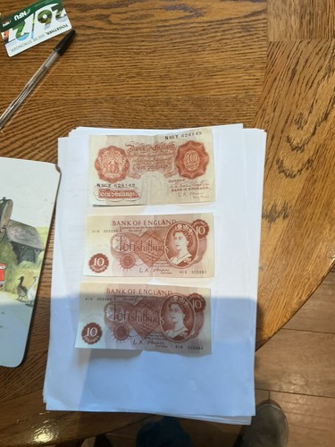 Three ten shilling - shilling, notes