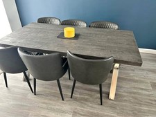 Grey Composite dining table and 6 chairs