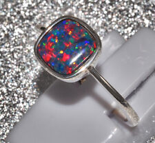 925 sterling silver ring also gold plated with a synth. Opal in 3 Variants