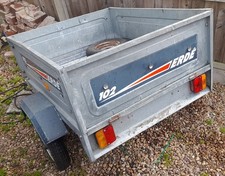 Erde 102 Trailer. tipping