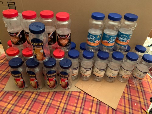 Empty plastic peanut jars - empty,