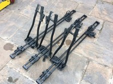 3 x Thule lockable bike racks roof mounted.