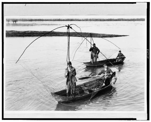Photo four men row boats - photo:four,