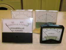 Mix of four moving coil panel meters