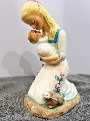 Goebel mother embracing child - goebel,