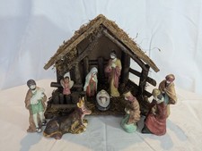 Chritmas Nativity Scene With Porcelain Figures In A Wooden Stable Set