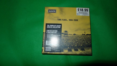 Oasis time flies - flies, 1994-2009
