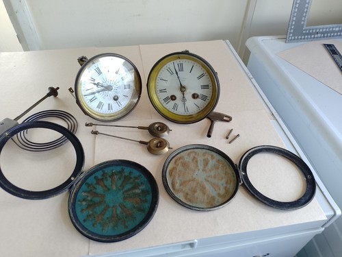 Two vintage clock movements - two,
