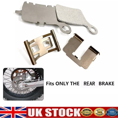 Rear brake caliper retaining - rear,