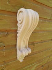 A Pair of extra large carved hardwood (birch) shop front door fireplace corbels