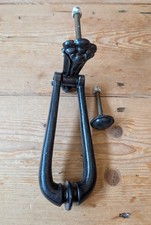 A RECLAIMED CAST IRON DOOR
