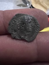Unidentified ROMAN coin. Soldier spearing fallen horseman. Found in UK