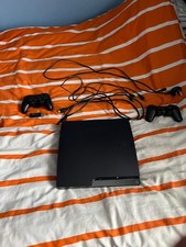 ps3 slim 2 console with wires