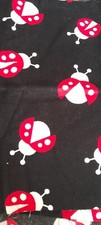 Black Ladybugs Needlecord Fabric