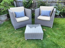 Two (2) Indian Ocean All Weather Armchairs and Drinks Table Garden Furniture.