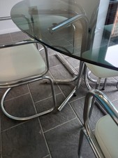 Oval Smoked Glass Dining Table